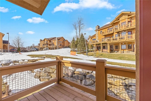 view of snow covered deck