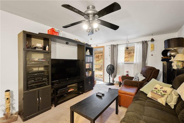 living room with light carpet and ceiling fan