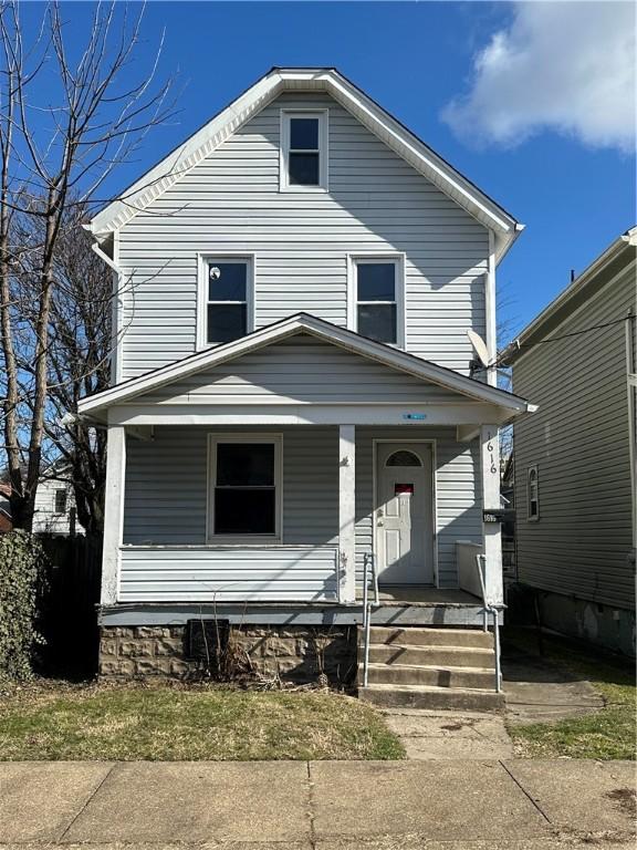 view of front of home featuring covered porch