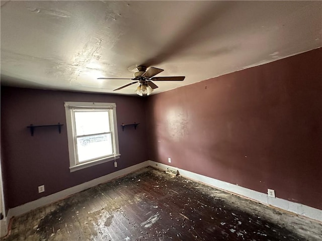 spare room with ceiling fan