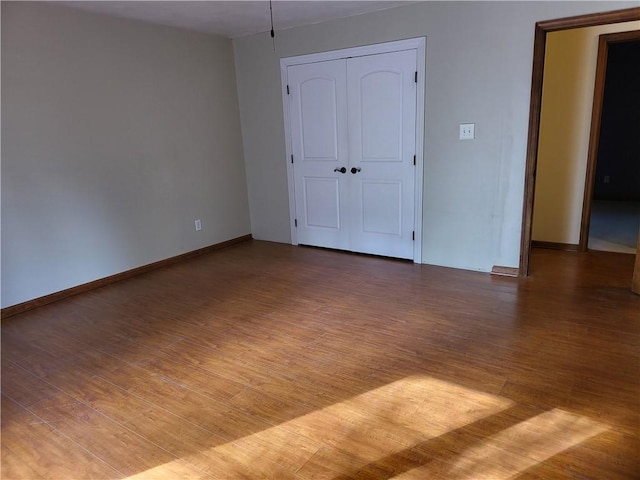 empty room featuring hardwood / wood-style floors