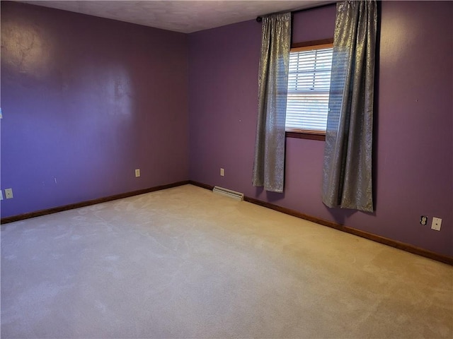 spare room with light carpet