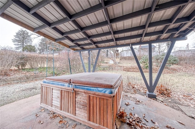 view of patio with a hot tub