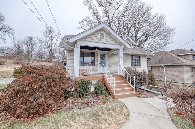 bungalow-style house featuring covered porch