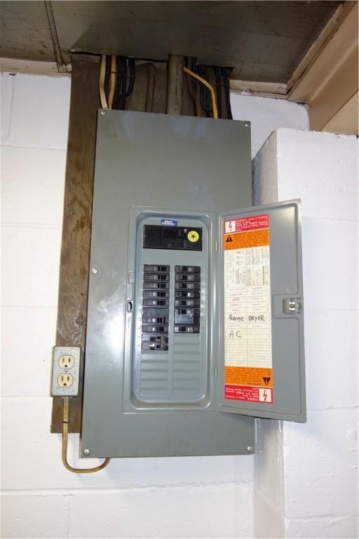 utility room featuring electric panel