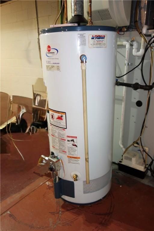 utility room featuring gas water heater