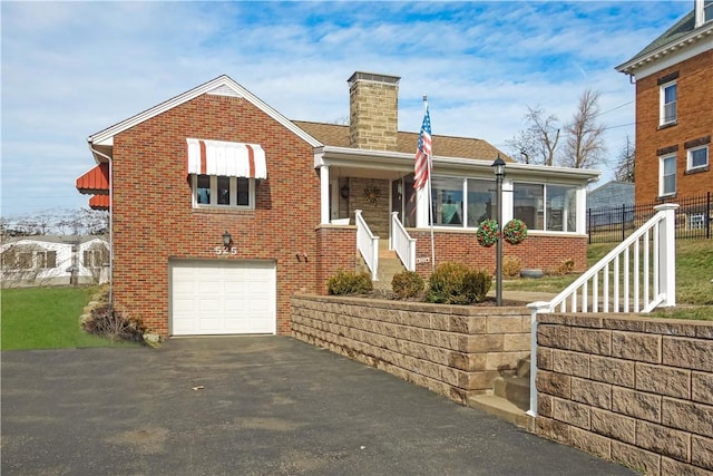 view of front of home featuring a garage