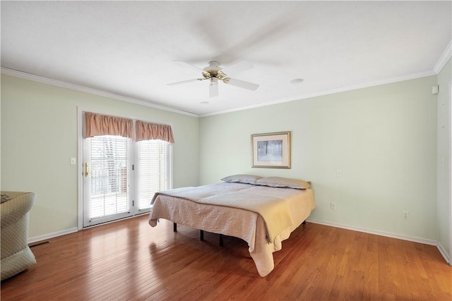 bedroom featuring hardwood / wood-style flooring, ornamental molding, access to outside, and ceiling fan