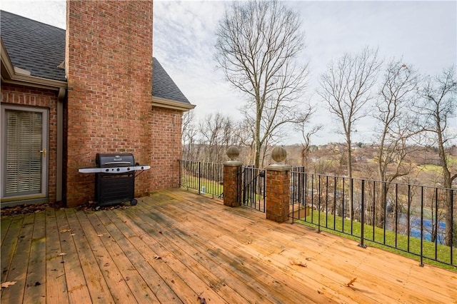 wooden terrace with grilling area