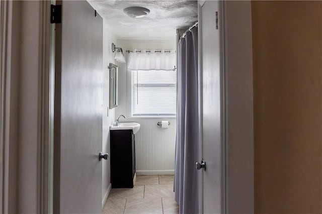 bathroom featuring vanity and a textured ceiling