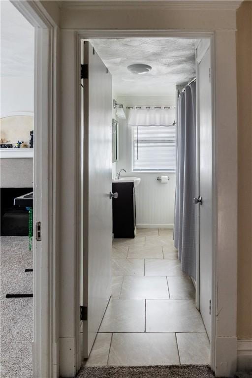 bathroom featuring tile patterned flooring