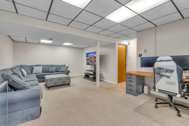 carpeted office featuring a drop ceiling