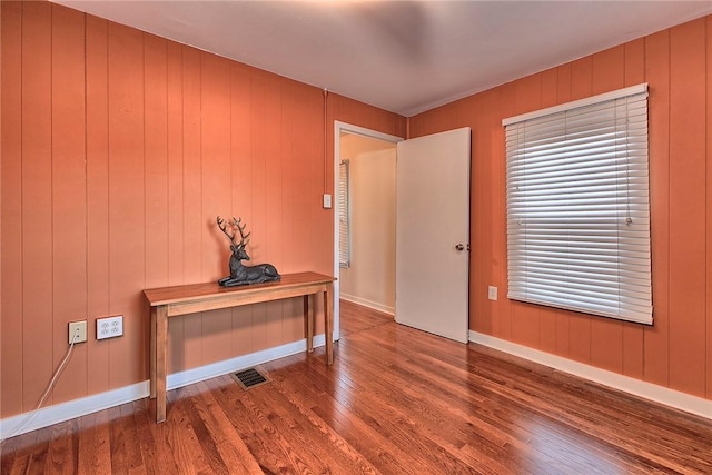 foyer entrance with hardwood / wood-style floors