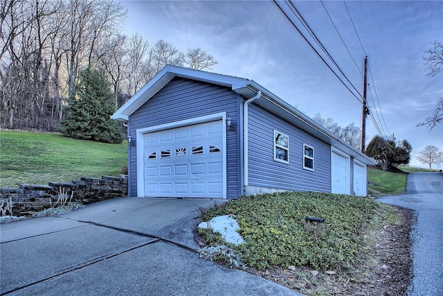 garage with a yard