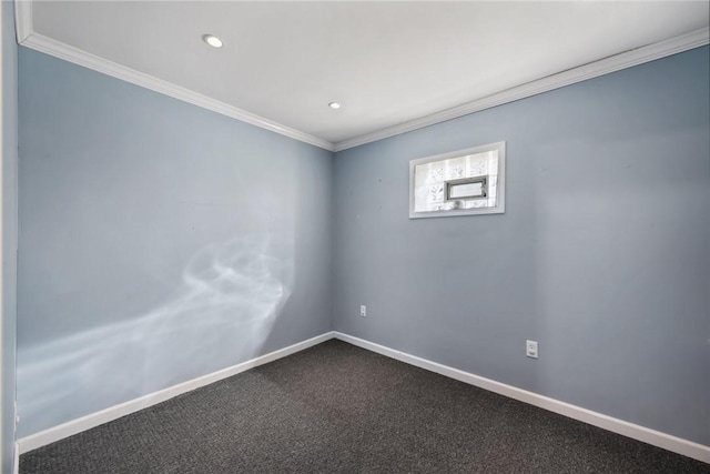 carpeted empty room with ornamental molding