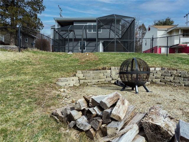 view of yard with an outdoor fire pit