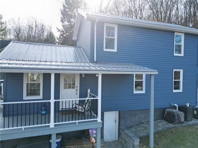 back of house with covered porch