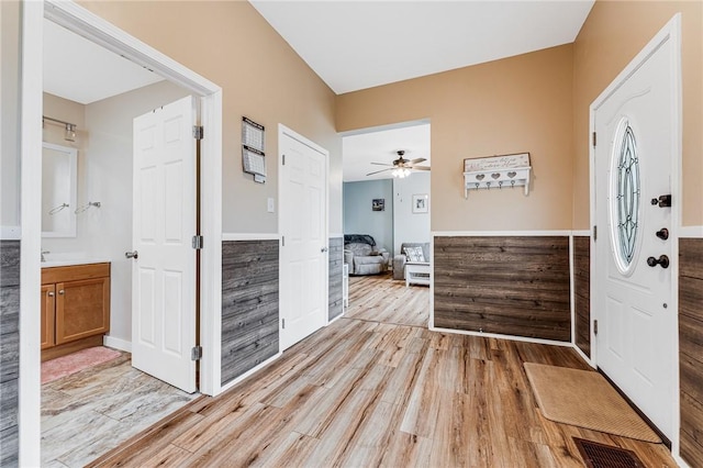 entrance foyer with light wood-type flooring