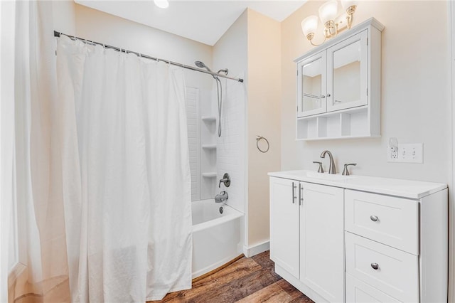 bathroom with vanity, hardwood / wood-style floors, and shower / bath combination with curtain