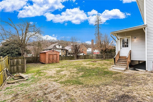 view of yard featuring a storage unit