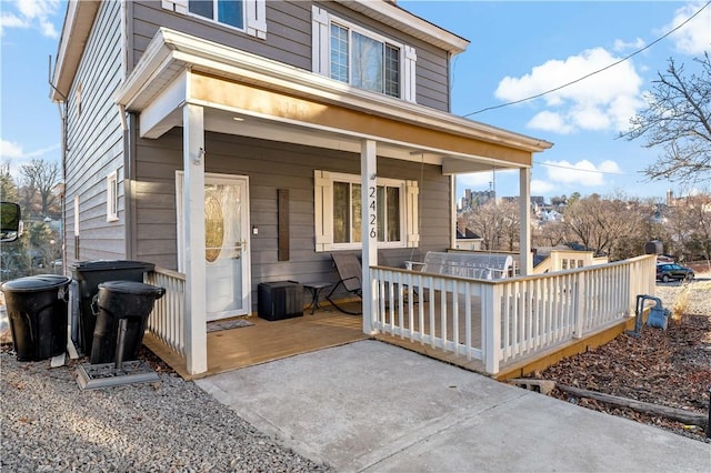 entrance to property with a porch