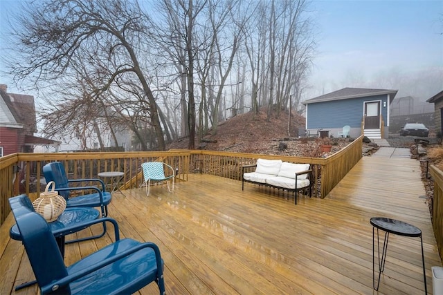 wooden deck featuring grilling area