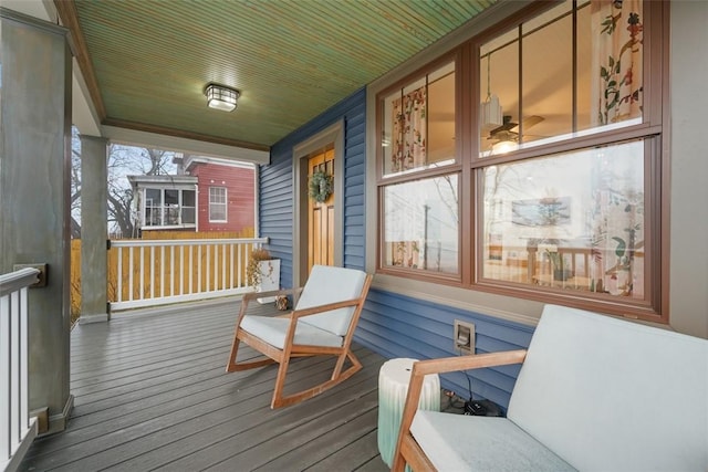 wooden deck featuring covered porch