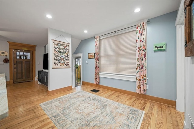 foyer entrance featuring light hardwood / wood-style floors