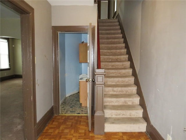 stairs with parquet floors