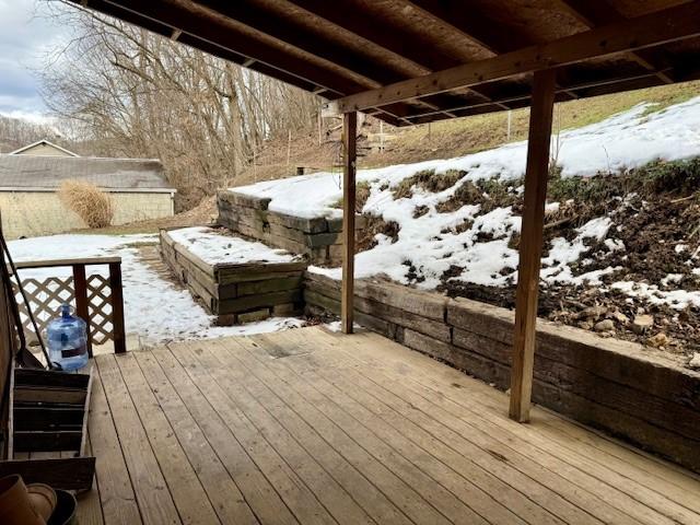 view of snow covered deck