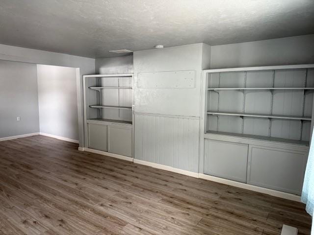 interior space featuring dark wood-type flooring