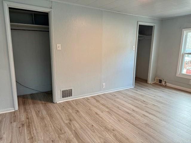 unfurnished bedroom featuring light hardwood / wood-style flooring