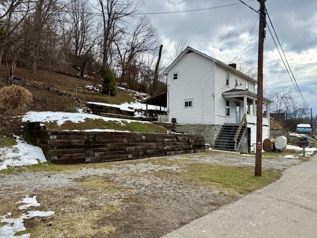 view of snow covered property