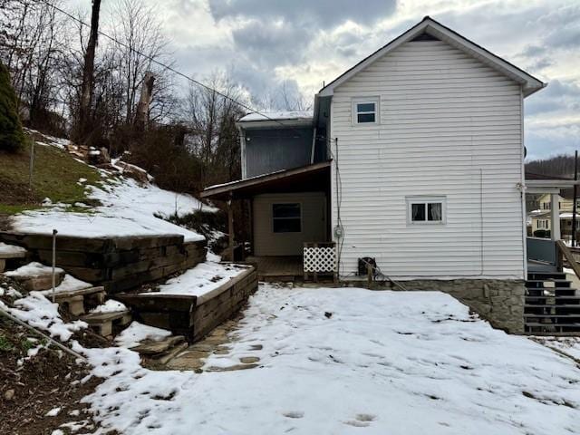 view of snow covered property