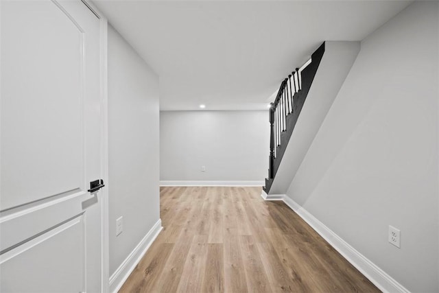 corridor featuring light hardwood / wood-style flooring