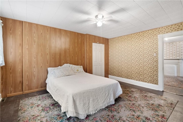 bedroom with dark wood-type flooring and ceiling fan