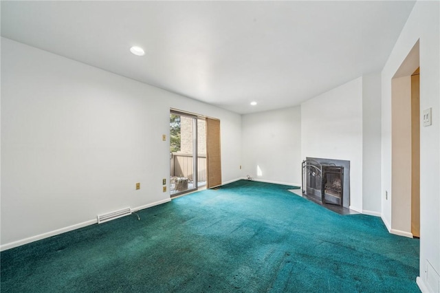 unfurnished living room featuring dark carpet