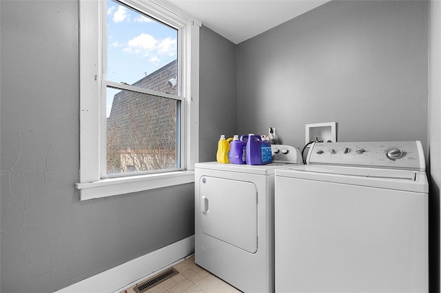 laundry area with washer and clothes dryer