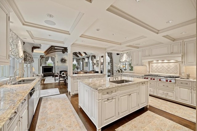 134 S Dr, Fox Chapel, PA 15238 - kitchen featuring a sink, stainless steel appliances, dark wood finished floors, open floor plan, and coffered ceiling
