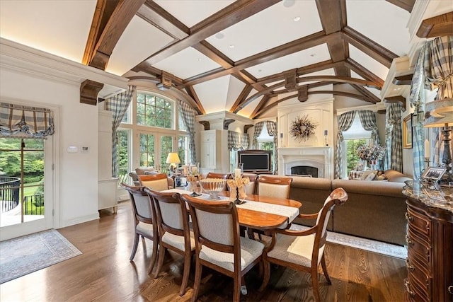 134 S Dr, Fox Chapel, PA 15238 - dining space with a large fireplace, beamed ceiling, dark wood finished floors, baseboards, and high vaulted ceiling