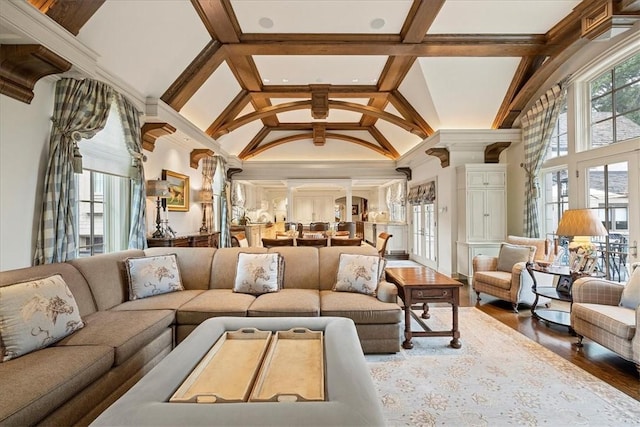 134 S Dr, Fox Chapel, PA 15238 - living area with decorative columns, high vaulted ceiling, and wood finished floors