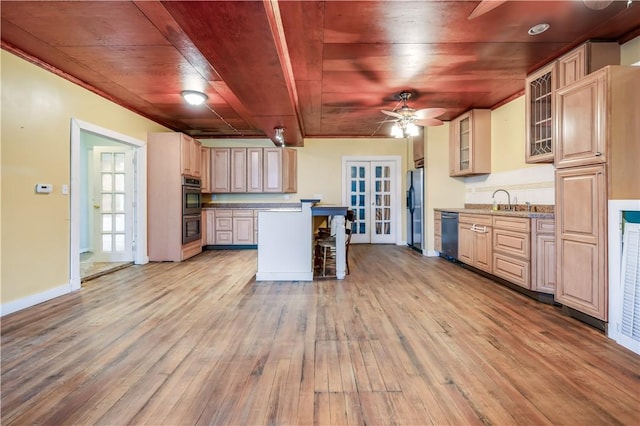 kitchen featuring stainless steel appliances, a kitchen island, wooden ceiling, and light hardwood / wood-style flooring