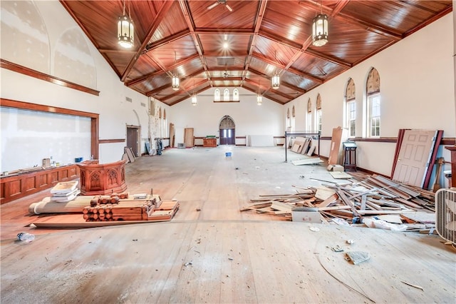 misc room with high vaulted ceiling and wood ceiling