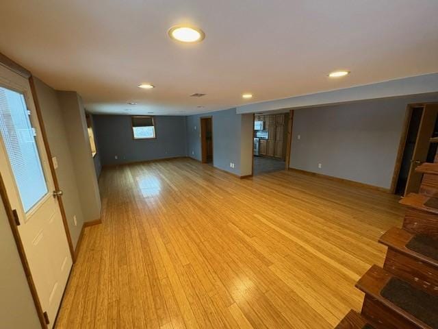 basement featuring light hardwood / wood-style flooring