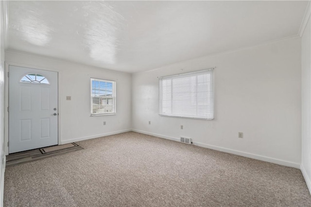 entrance foyer with carpet