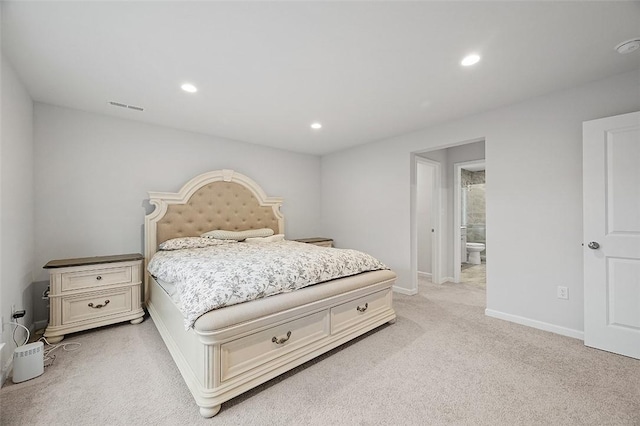 bedroom featuring light colored carpet