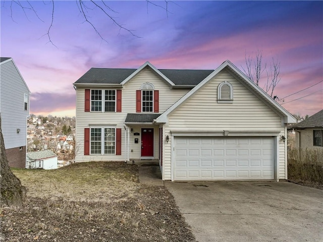 view of front of home with a garage