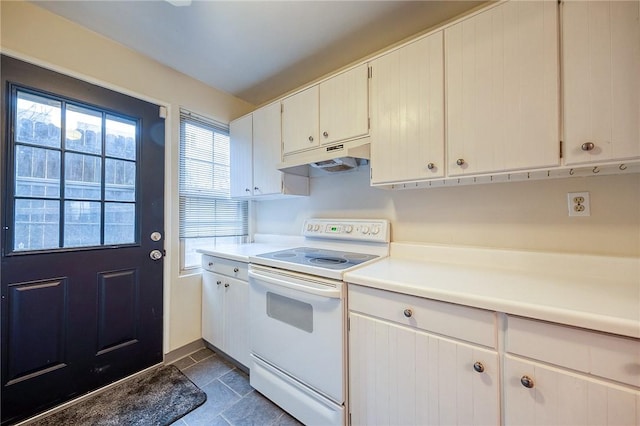 kitchen with white cabinetry and white electric stove