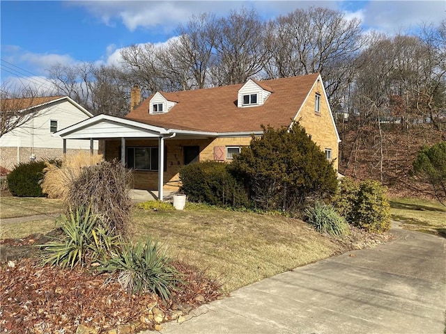 view of front of home with a front yard