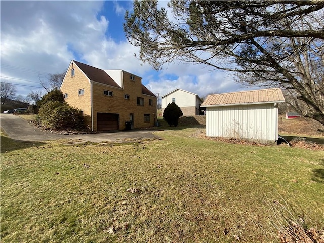 view of yard with a garage